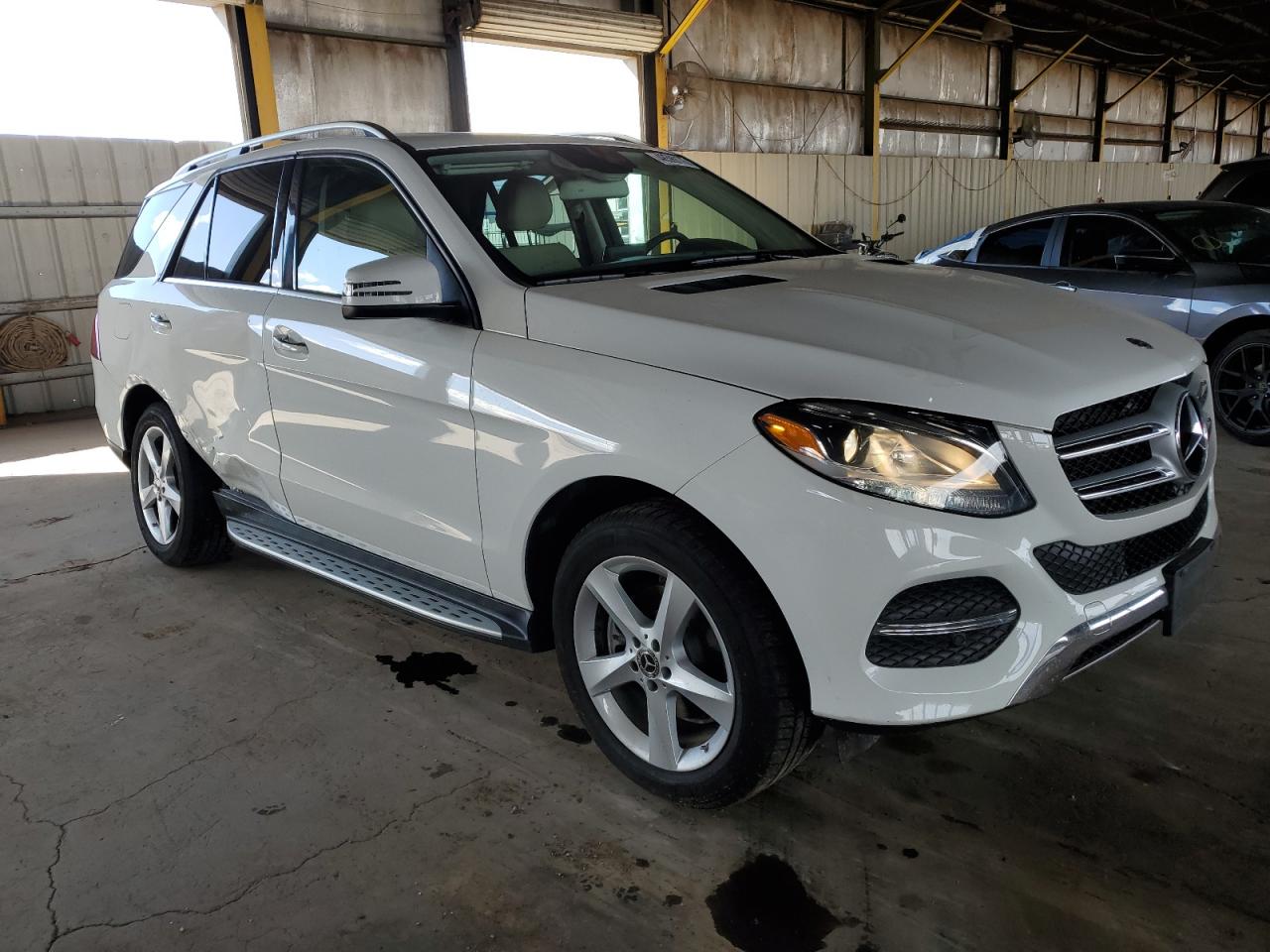 2018 Mercedes-Benz GLE VIN 4JGDA5JB5JB037008 Copart auction photo, side / rear end damage thumbnail 4