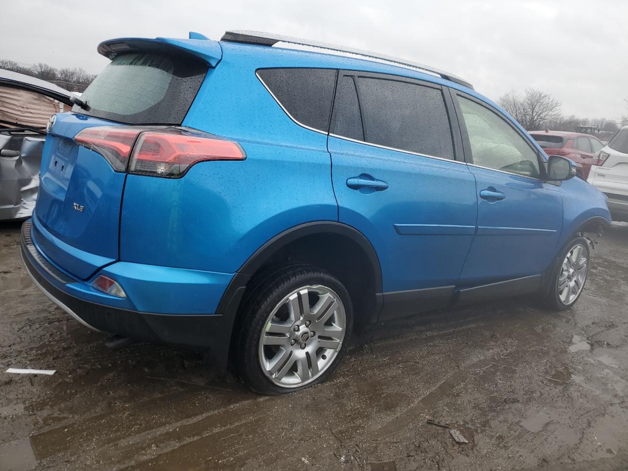 2018 Toyota RAV 4 VIN JTMWFREV3JD131970 Copart auction photo, front end / side damage thumbnail 3