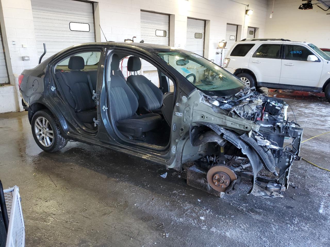 2015 Chevrolet Sonic VIN 1G1JC5SH5F4181988 Copart auction photo, vandalism / stripped damage thumbnail 4