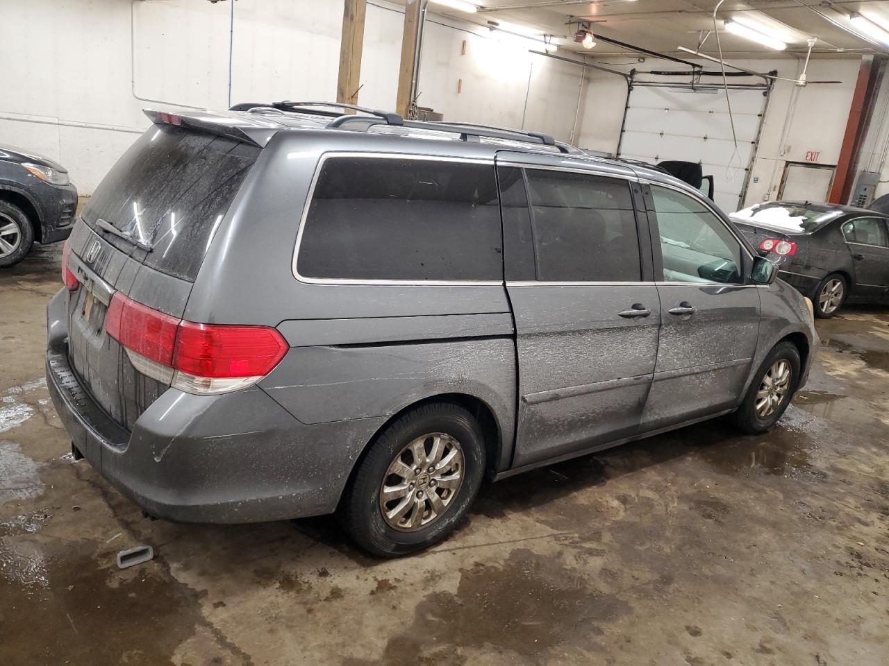2010 Honda Odyssey VIN 5FNRL3H63AB087257 Copart auction photo, minor dent/scratches damage thumbnail 3