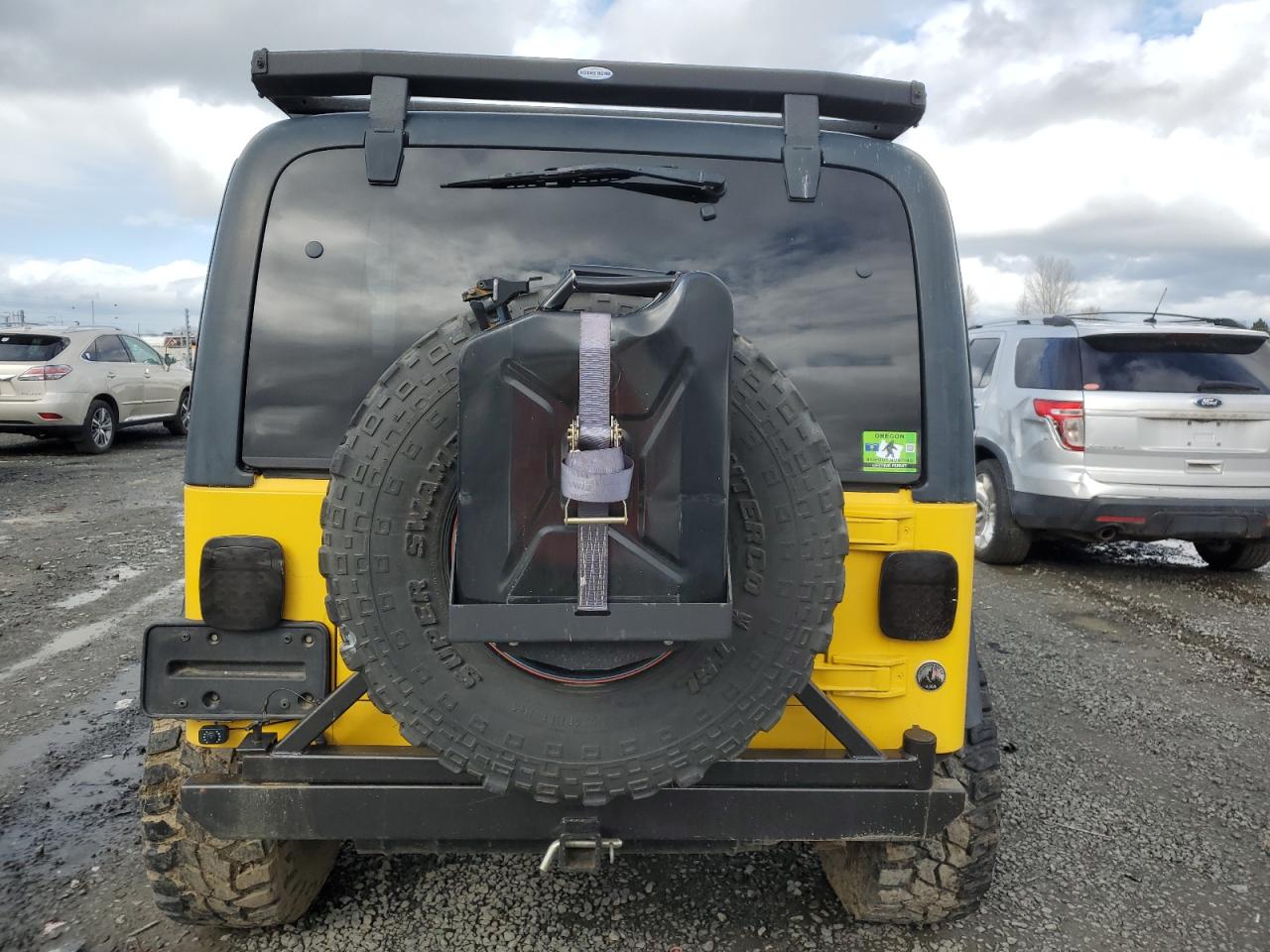 2000 Jeep Wrangler VIN 1J4FA49S3YP747043 Copart auction photo, burn damage thumbnail 6