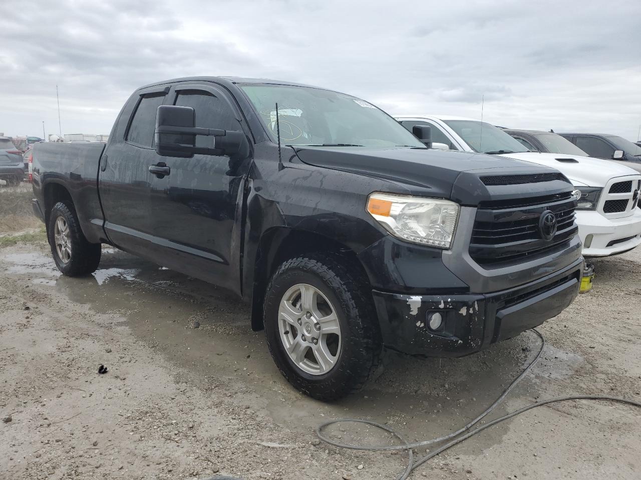 2016 Toyota Tundra VIN 5TFRM5F17GX101501 Copart auction photo, water/flood damage thumbnail 4