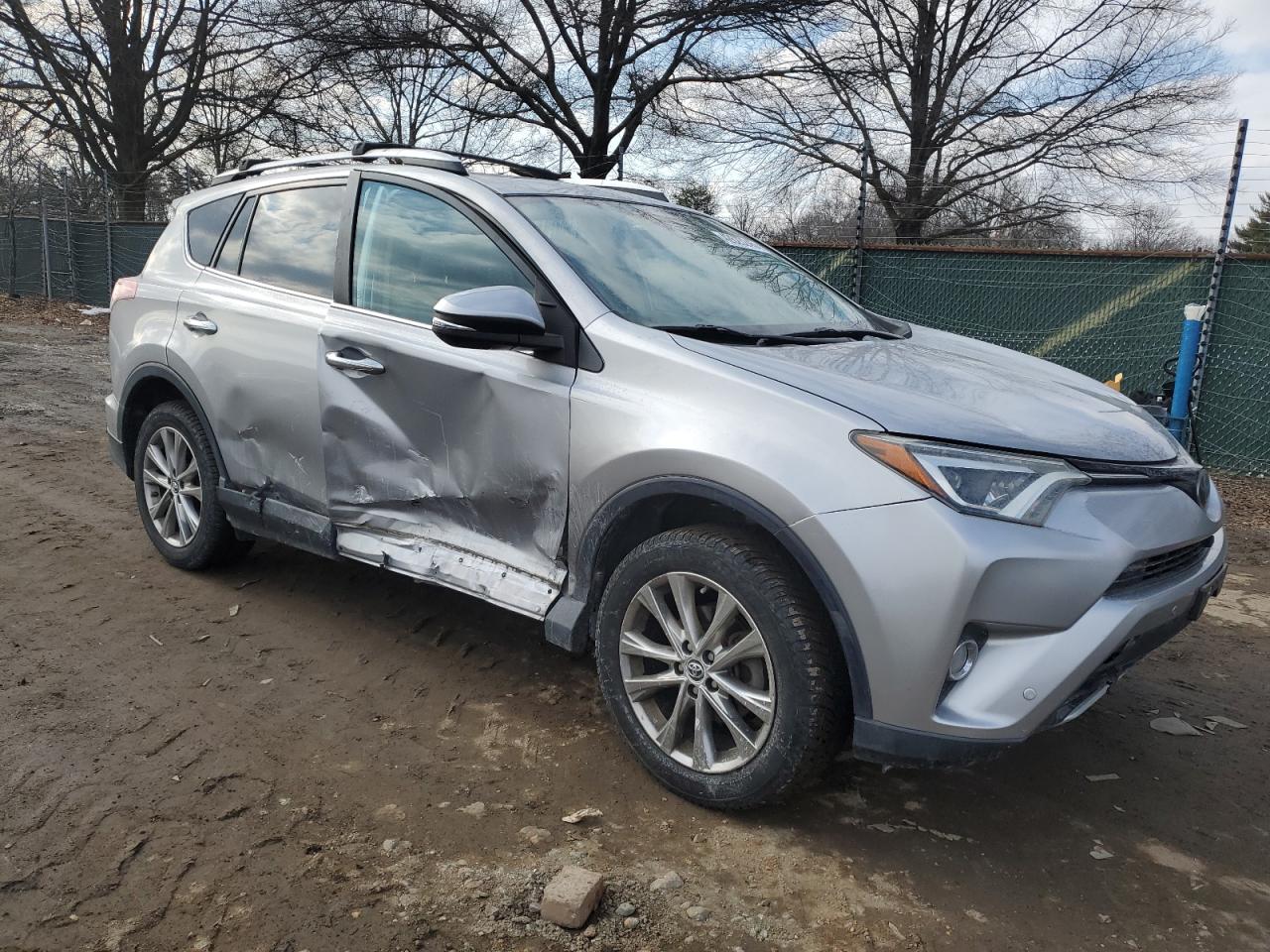 2016 Toyota RAV 4 VIN 2T3DFREV6GW424362 Copart auction photo, side / minor dent/scratches damage thumbnail 4