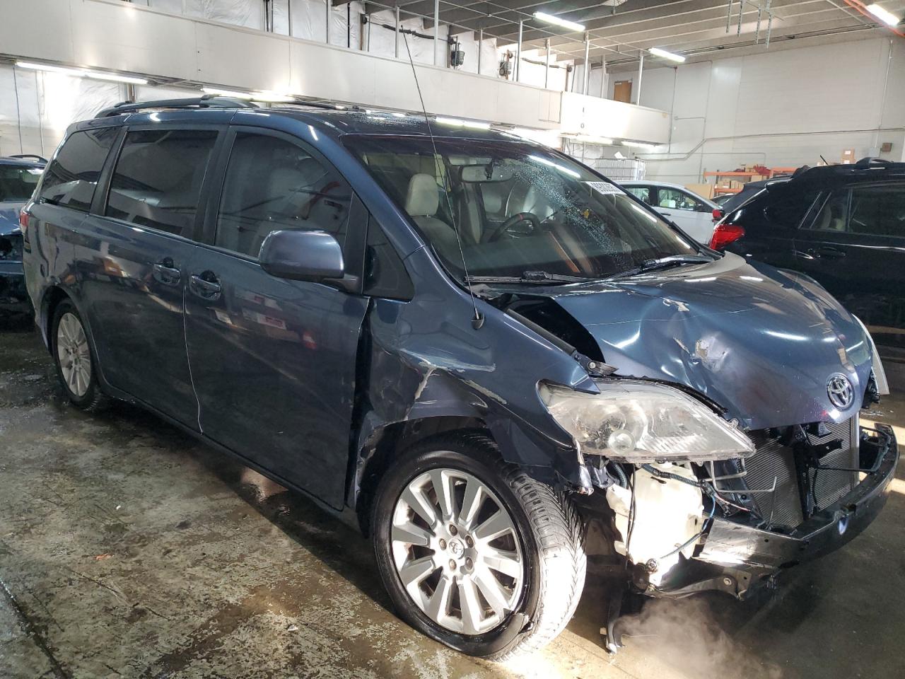 2014 Toyota Sienna VIN 5TDDK3DC9ES080534 Copart auction photo, front end / side damage thumbnail 4