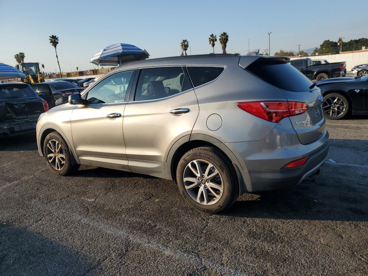 2015 Hyundai Santa Fe VIN 5XYZUDLA3FG286792 Copart auction photo, side / minor dent/scratches damage thumbnail 2