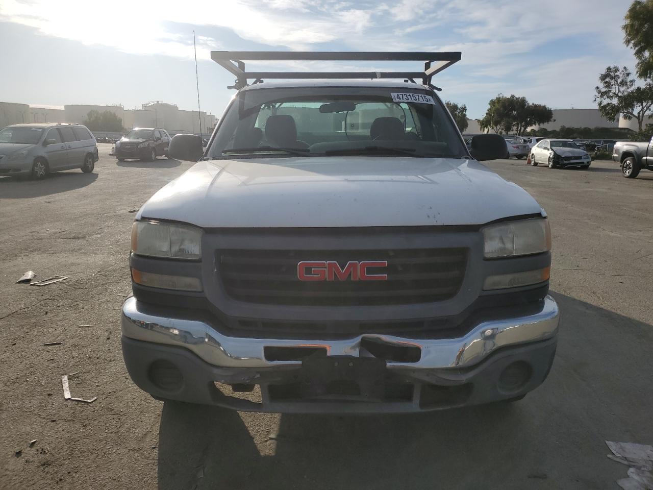 2005 GMC Sierra VIN 1GDHC24U65E138733 Copart auction photo, vandalism damage thumbnail 5