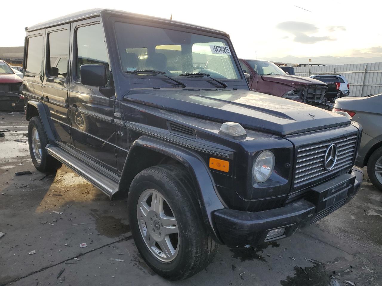 2002 Mercedes-Benz G-klasse VIN WDCYR49E72X133986 Copart auction photo, rear end damage thumbnail 4