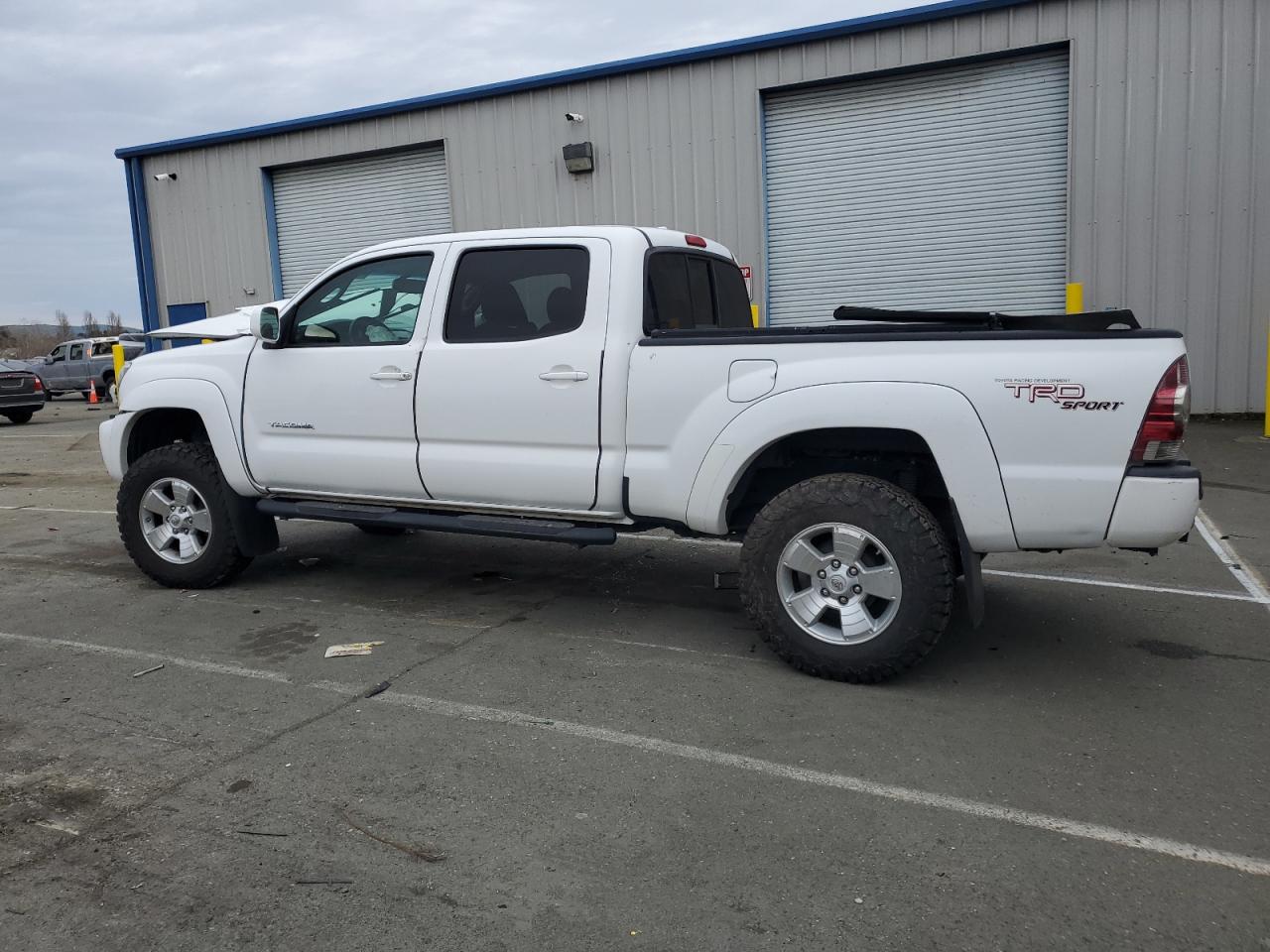 2010 Toyota Tacoma VIN 3TMKU4HN8AM026865 Copart auction photo, front end / all over damage thumbnail 2