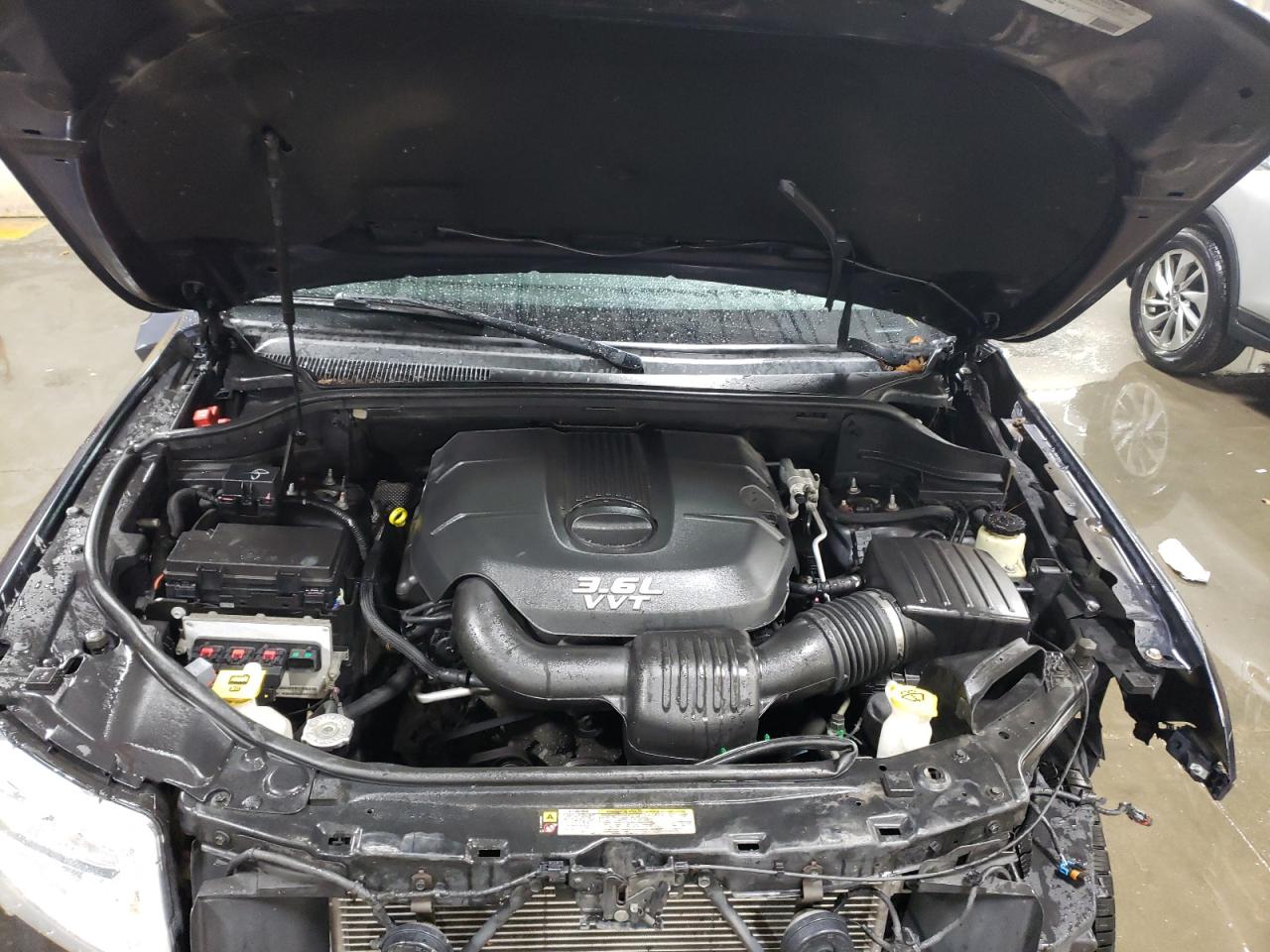 2012 Jeep Grand Cherokee VIN 1C4RJFAG3CC297352 Copart auction photo, front end damage thumbnail 11