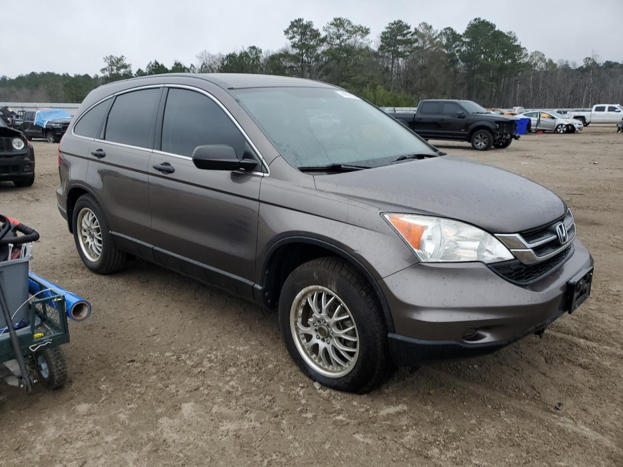 2011 Honda CR-V VIN 3CZRE3H35BG704566 Copart auction photo, side damage thumbnail 4