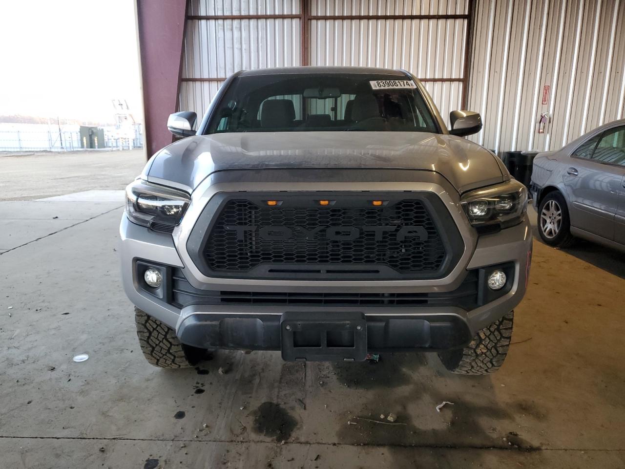 2016 Toyota Tacoma VIN 3TMDZ5BN7GM010609 Copart auction photo, rear end damage thumbnail 5