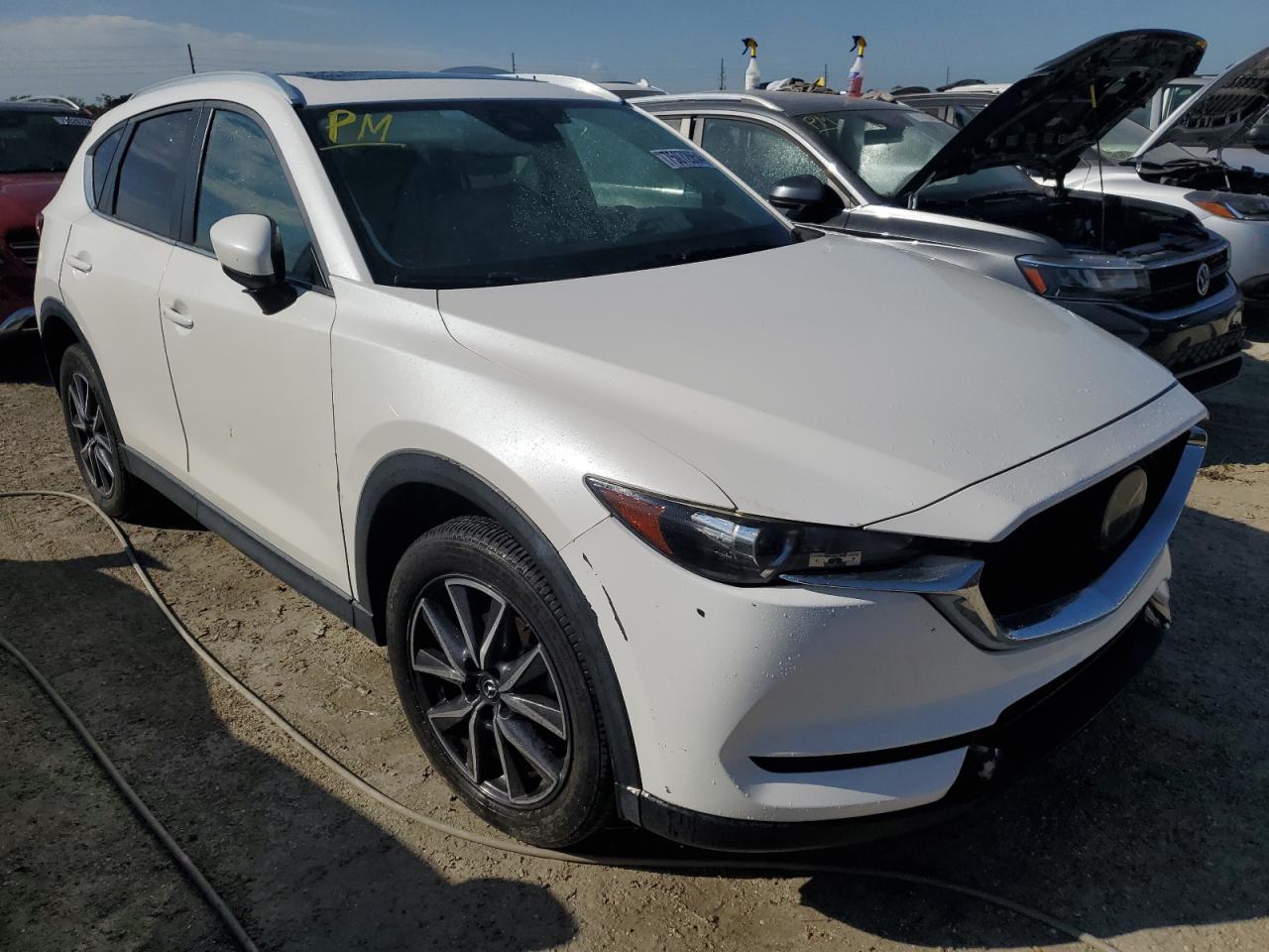 2018 Mazda CX-5 VIN JM3KFACM1J1333791 Copart auction photo, water/flood damage thumbnail 4