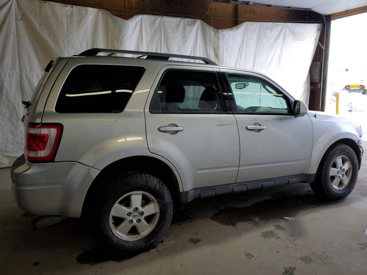 2010 Ford Escape VIN 1FMCU9EG1AKD31456 Copart auction photo, side / front end damage thumbnail 3