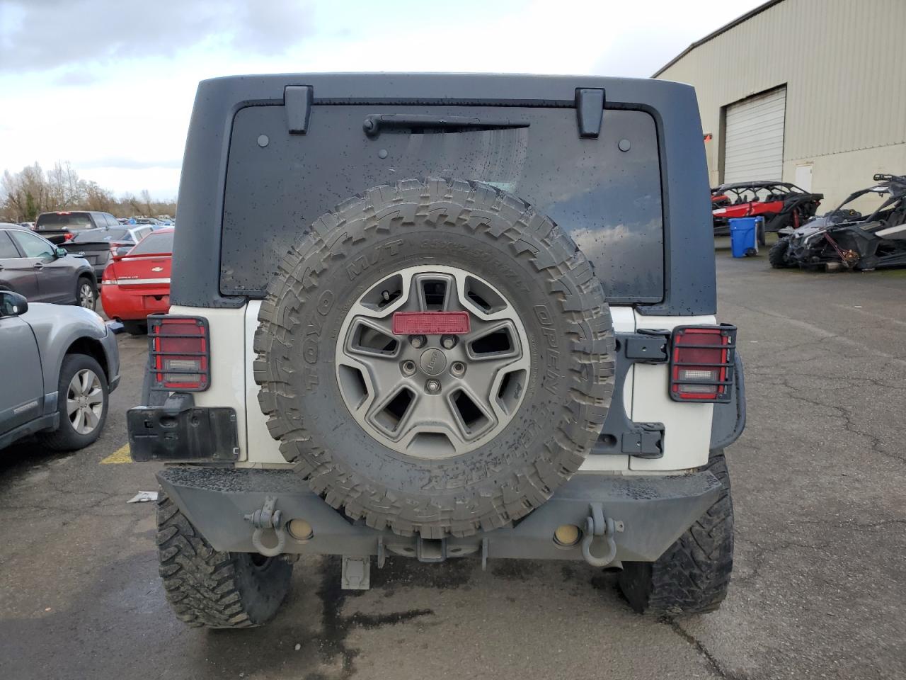 2015 Jeep Wrangler VIN 1C4BJWFGXFL693566 Copart auction photo, side / front end damage thumbnail 6