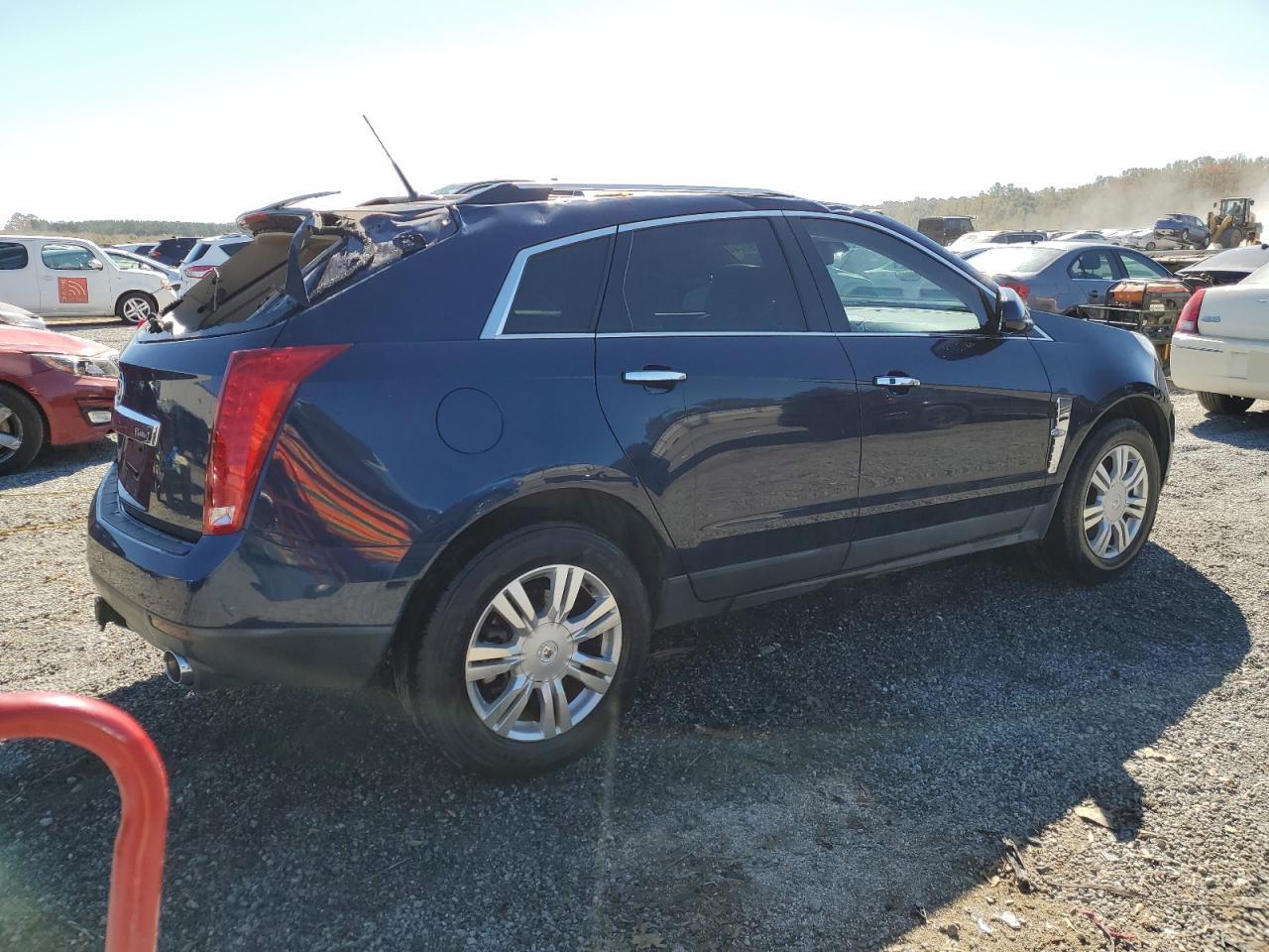 2011 Cadillac SRX VIN 3GYFNAEY8BS520002 Copart auction photo, front end / top/roof damage thumbnail 3