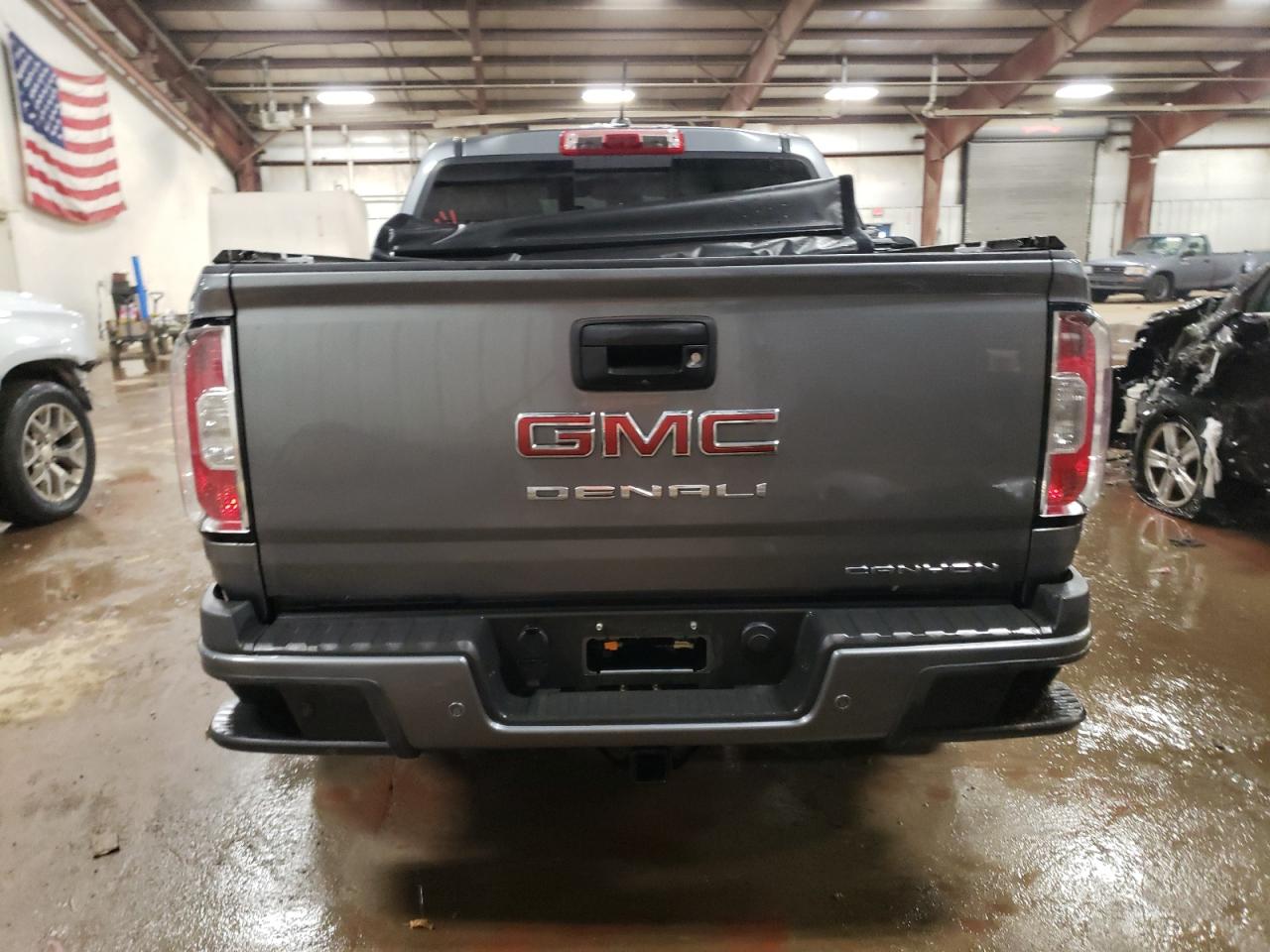 2021 GMC Canyon VIN 1GTG6EEN8M1127934 Copart auction photo, front end / undercarriage damage thumbnail 6