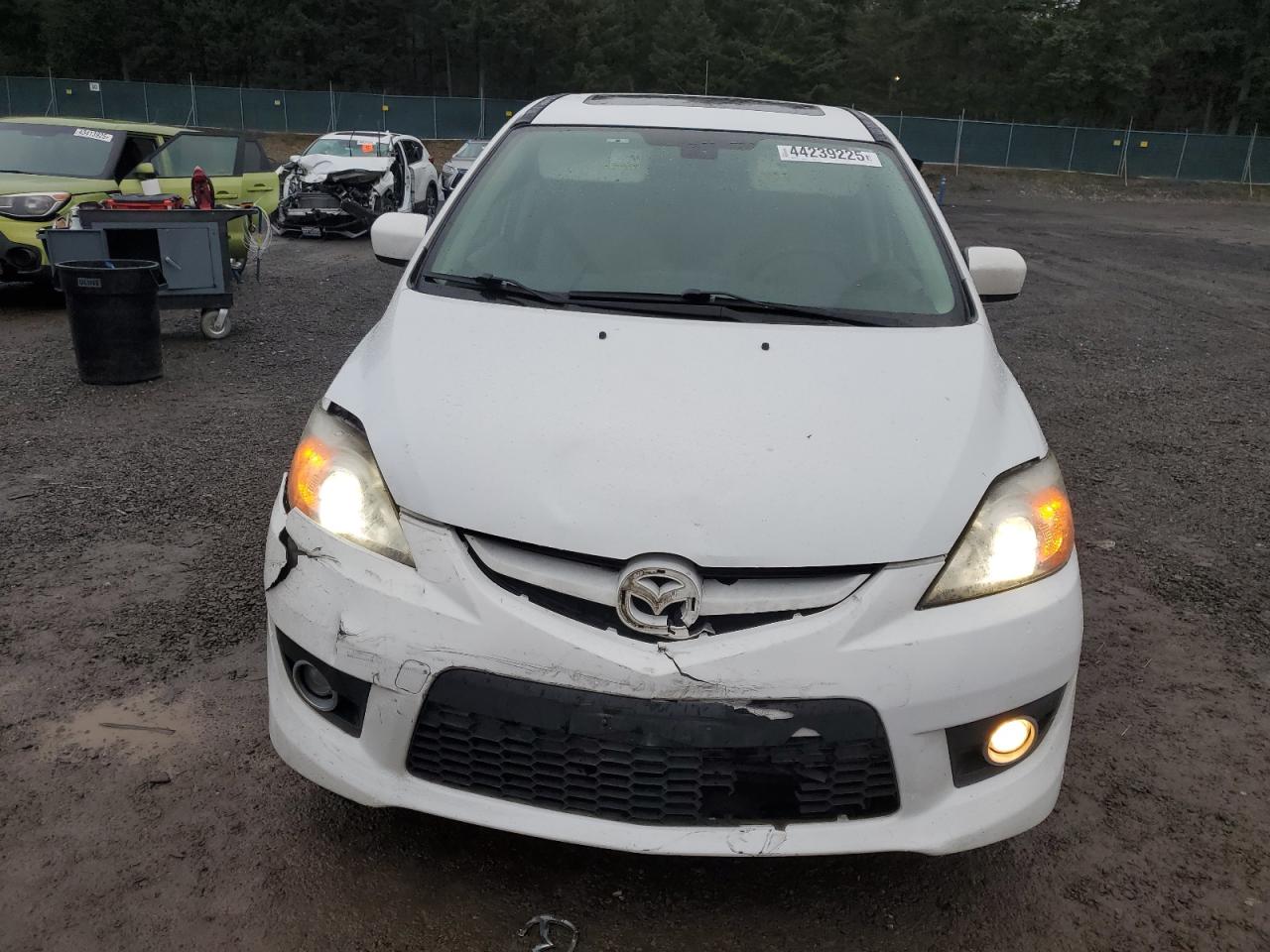 2009 Mazda 5 VIN JM1CR293990341566 Copart auction photo, front end damage thumbnail 5
