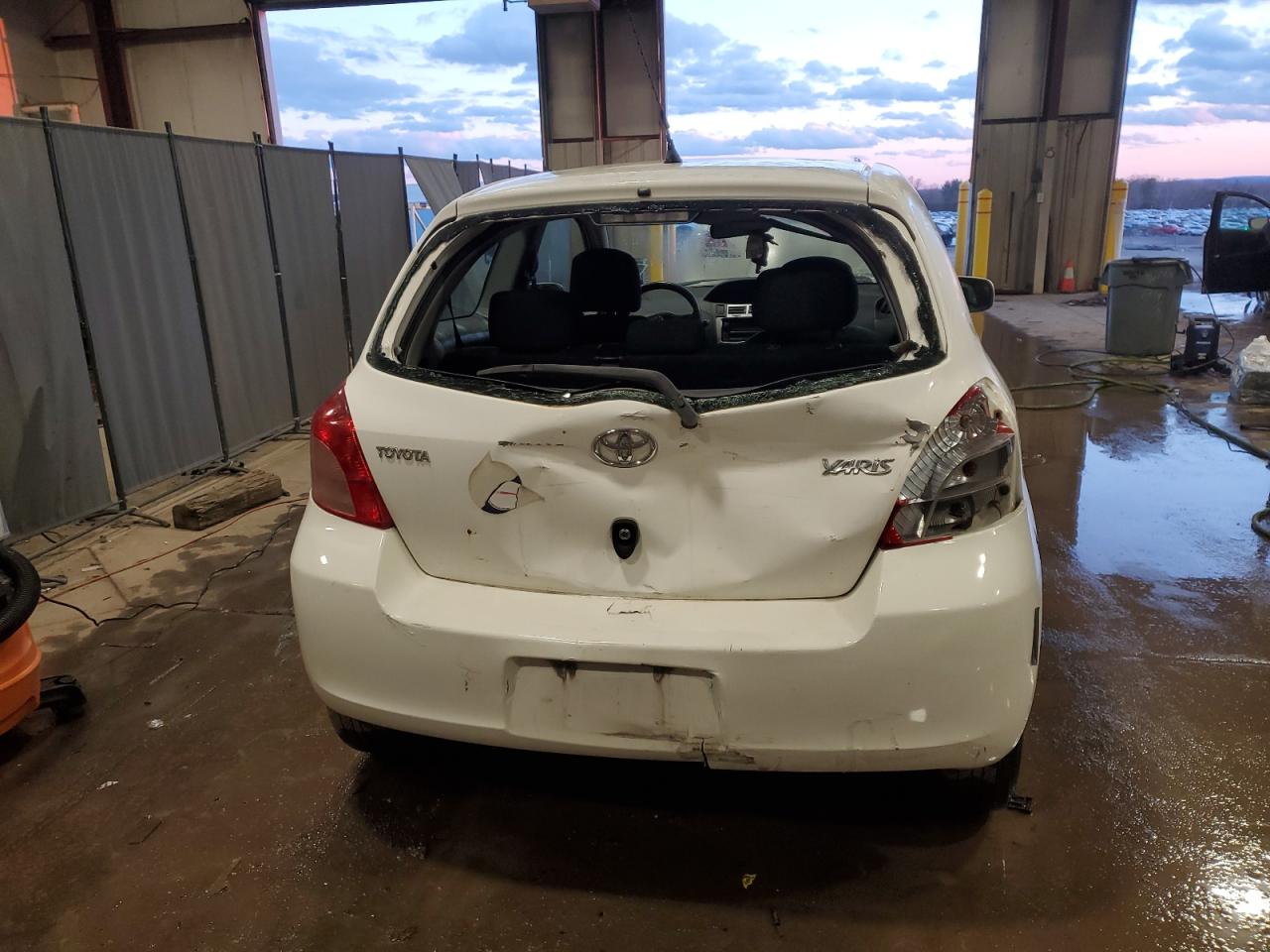 2007 Toyota Yaris VIN JTDJT923275081393 Copart auction photo, rear end damage thumbnail 6
