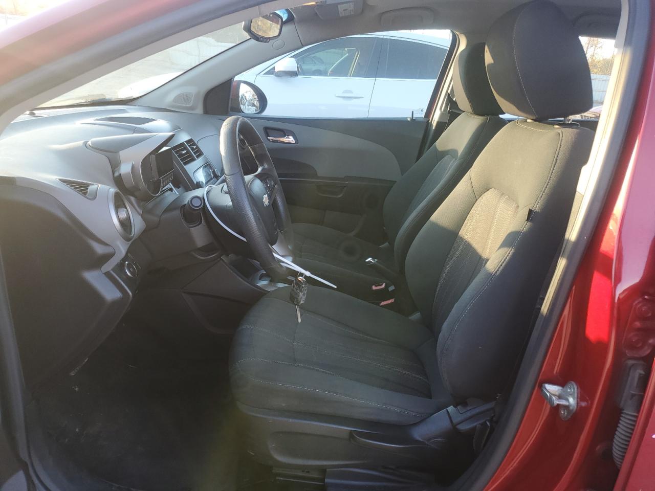 2012 Chevrolet Sonic VIN 1G1JC6SH1C4115052 Copart auction photo, front end / minor dent/scratches damage thumbnail 7