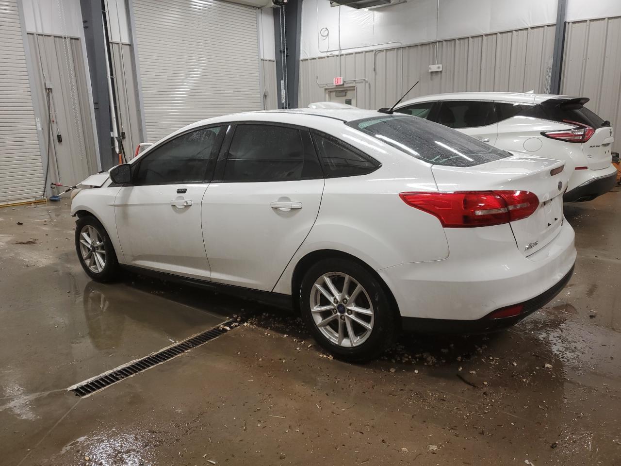 2015 Ford Focus VIN 1FADP3F23FL351098 Copart auction photo, front end / mechanical damage thumbnail 2