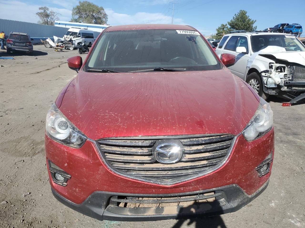 2016 Mazda CX-5 VIN JM3KE4CY9G0884427 Copart auction photo, water/flood damage thumbnail 5