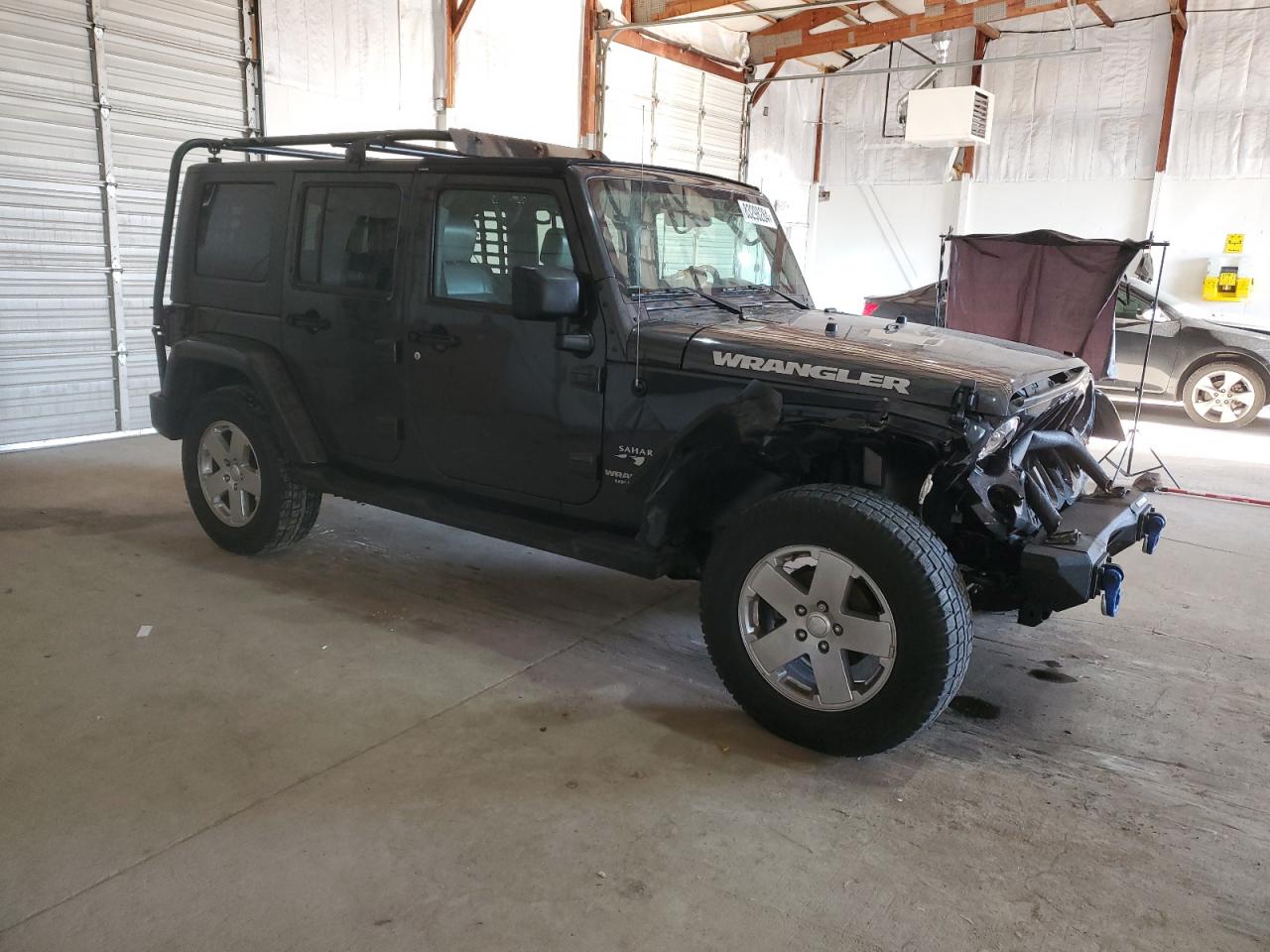 2010 Jeep Wrangler VIN 1J4BA5H16AL125739 Copart auction photo, front end / undercarriage damage thumbnail 4