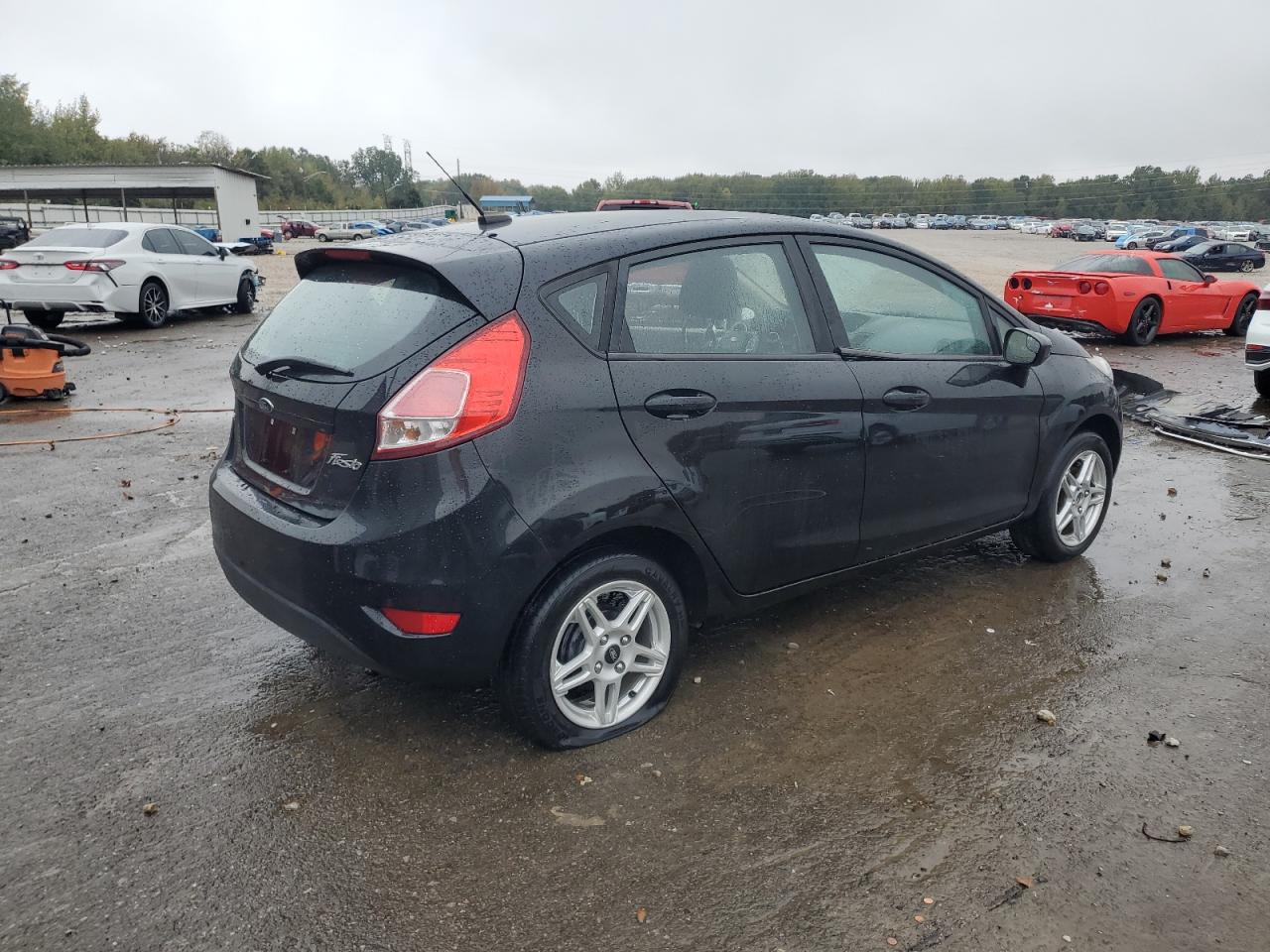 2017 Ford Fiesta VIN 3FADP4EJ6HM158749 Copart auction photo, side / rear end damage thumbnail 3