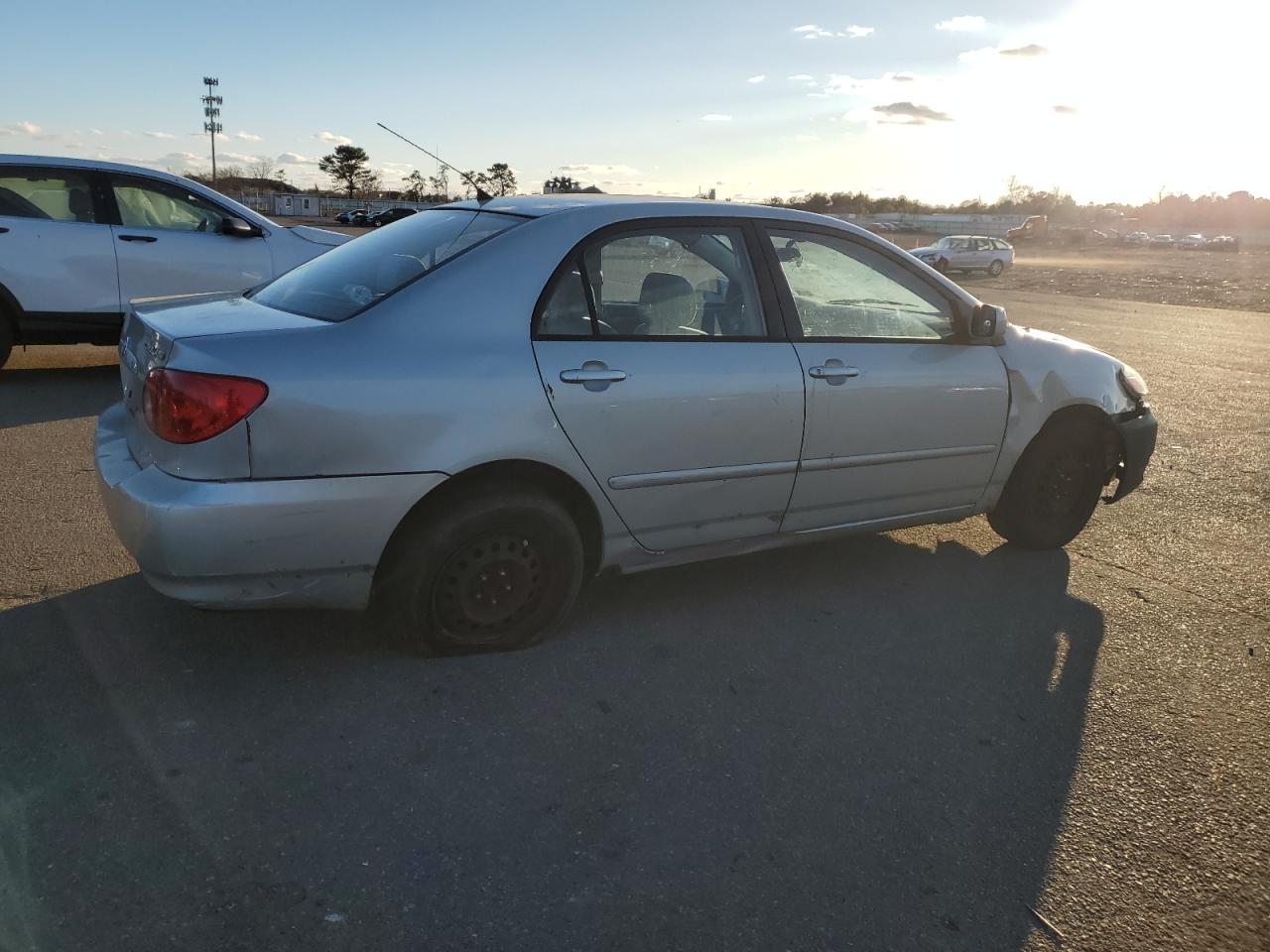 2004 Toyota Corolla VIN 2T1BR38E14C199216 Copart auction photo, side / front end damage thumbnail 3