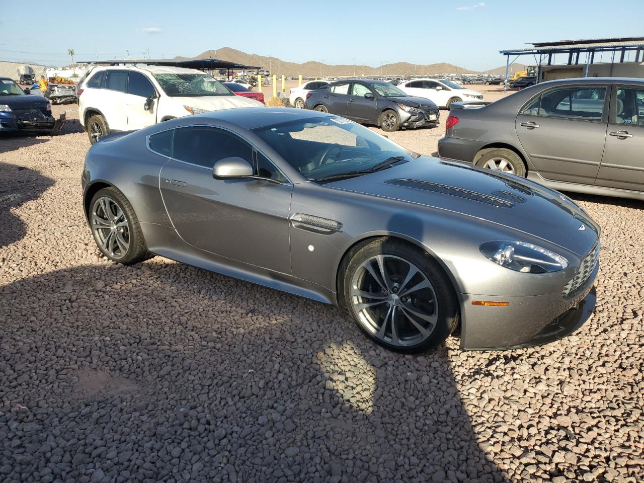 2011 Aston Martin Vantage VIN SCFEBBCF4BGS00791 Copart auction photo, minor dent/scratches damage thumbnail 4