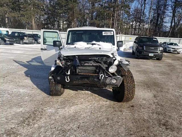 2017 Jeep Wrangler VIN 1C4GJWAG6HL601059 Copart auction photo, front end / top/roof damage thumbnail 11