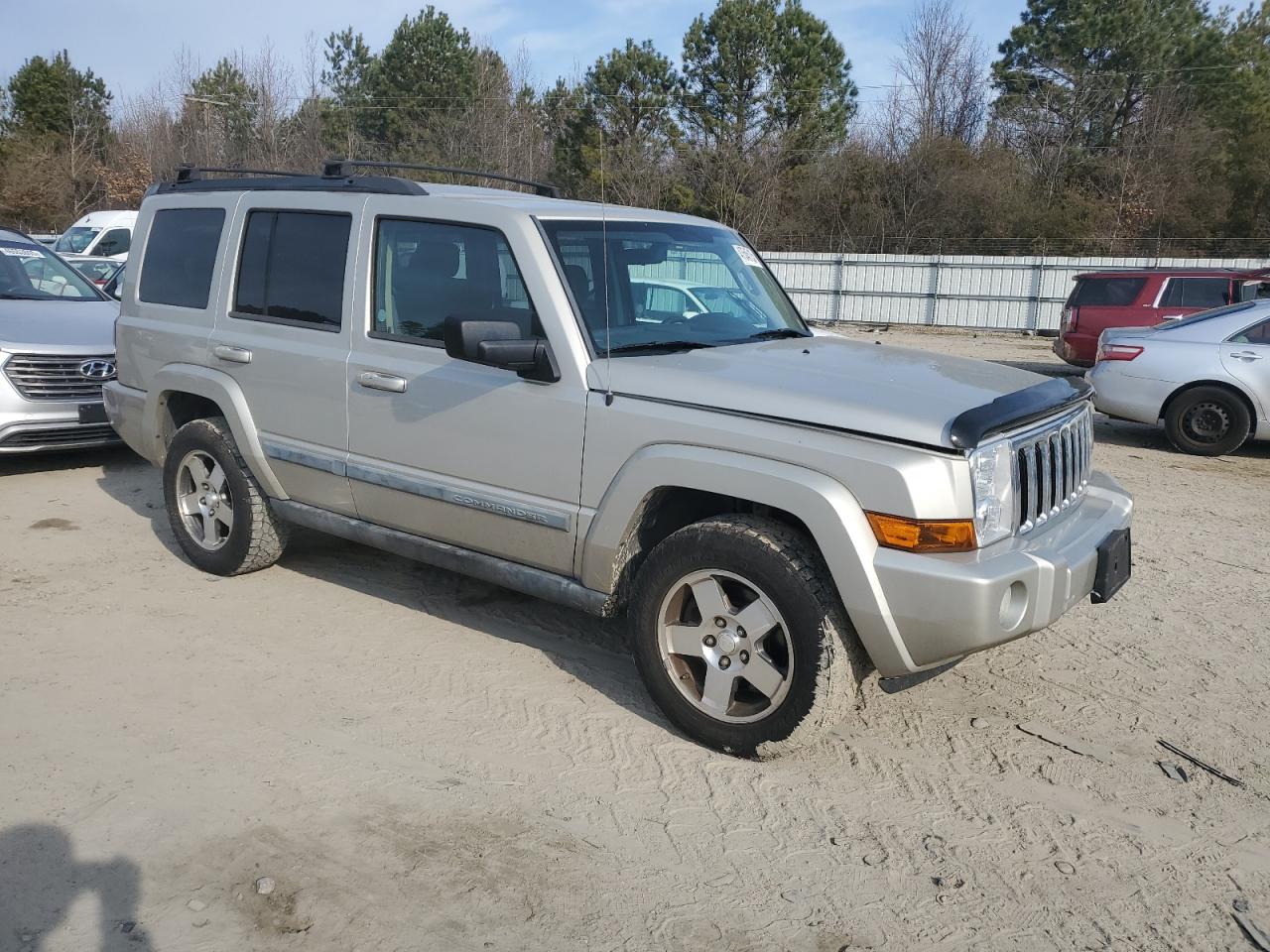 2009 Jeep Commander VIN 1J8HG48K69C511244 Copart auction photo, rear end / minor dent/scratches damage thumbnail 4