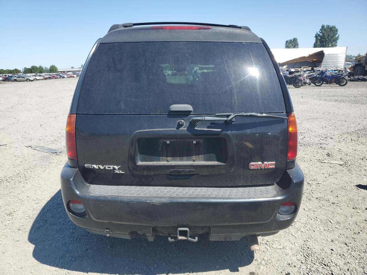 2006 GMC Envoy VIN 1GKET66MX66163341 Copart auction photo, side damage thumbnail 6