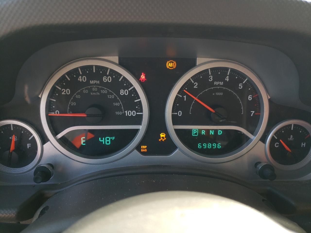 2009 Jeep Wrangler VIN 1J4GA59189L734931 Copart auction photo, front end damage thumbnail 9