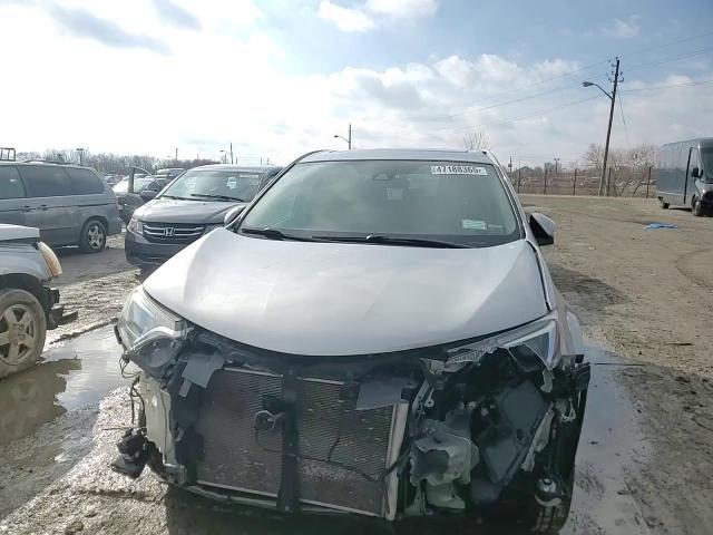 2018 Toyota RAV 4 VIN 2T3WFREV0JW446843 Copart auction photo, front end / minor dent/scratches damage thumbnail 12