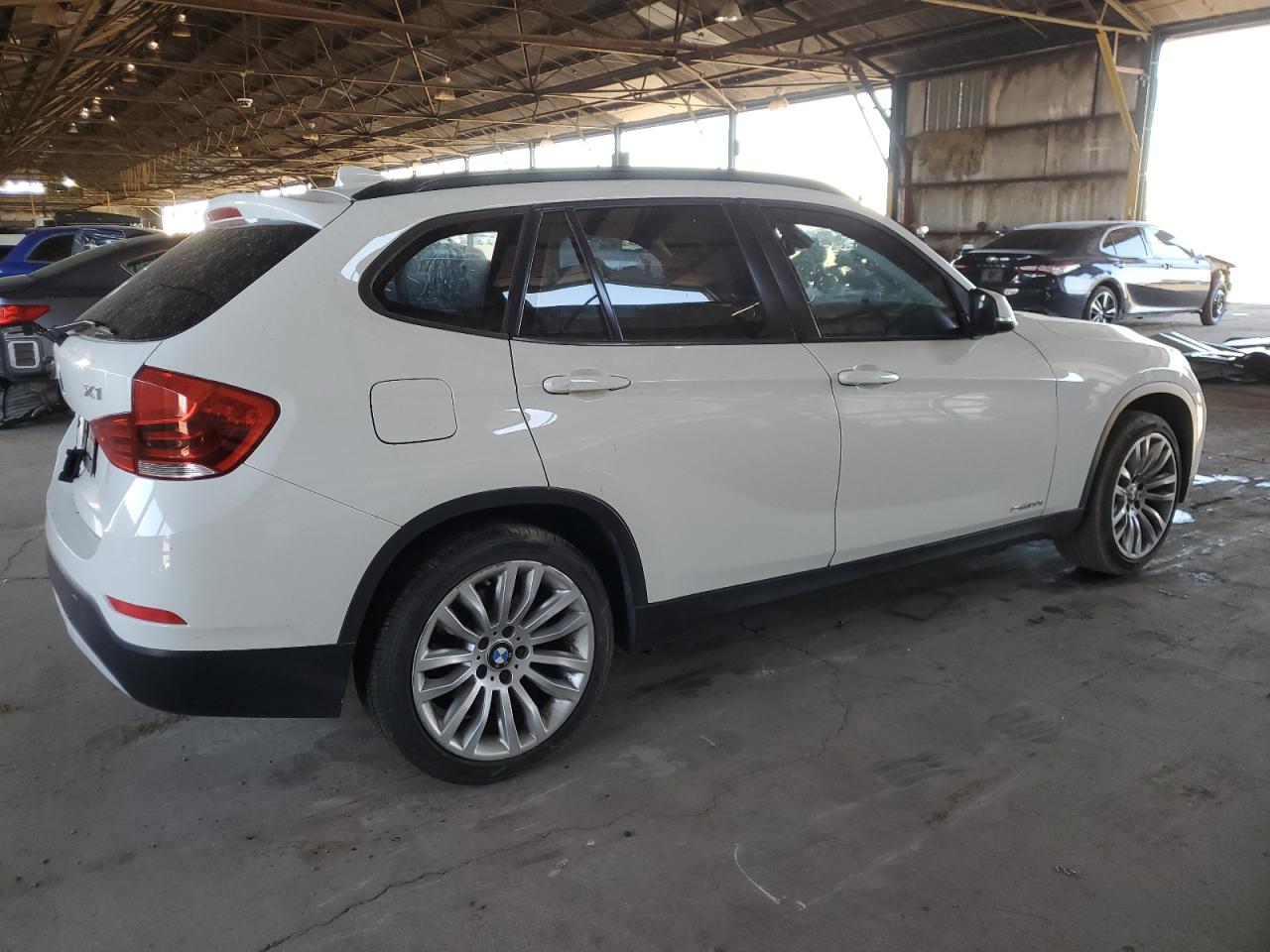 2014 BMW X1 VIN WBAVM1C54EVW50979 Copart auction photo, side / rear end damage thumbnail 3