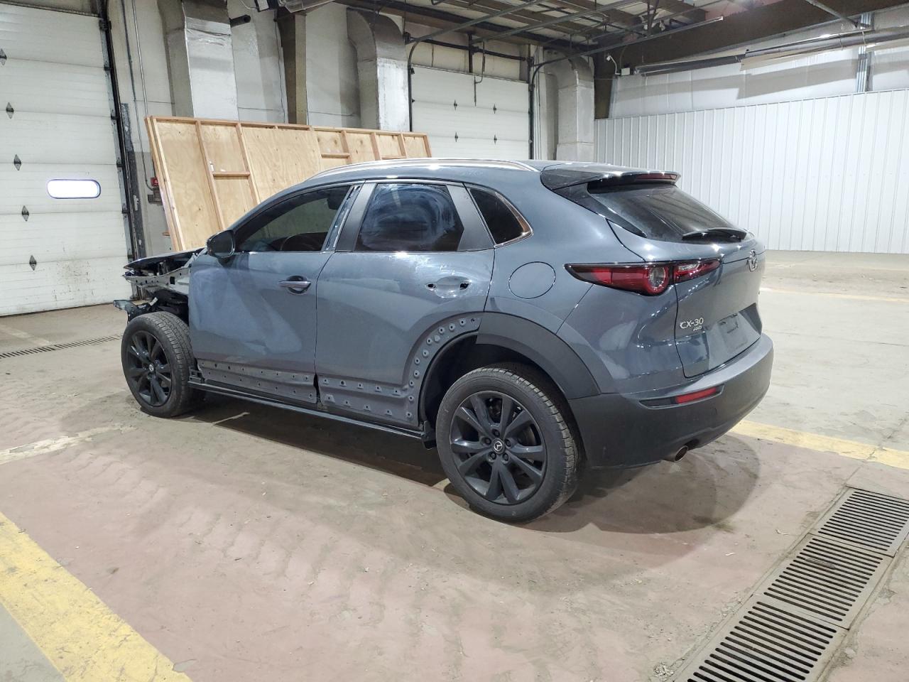 2022 Mazda CX-30 VIN 3MVDMBCL2NM445298 Copart auction photo, front end / side damage thumbnail 2