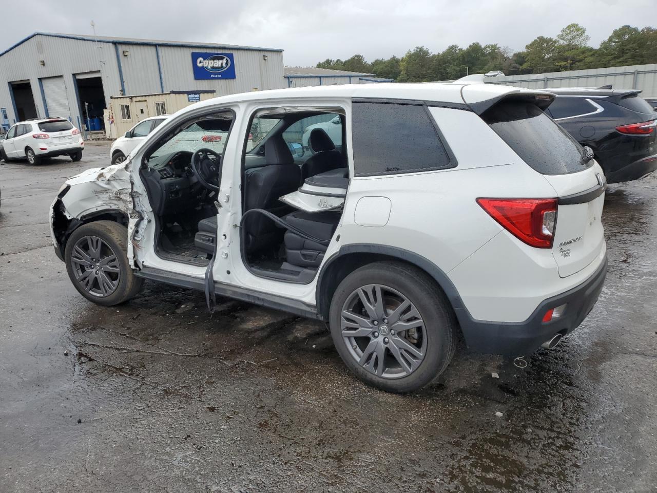 2020 Honda Passport VIN 5FNYF7H59LB003415 Copart auction photo, side / front end damage thumbnail 2