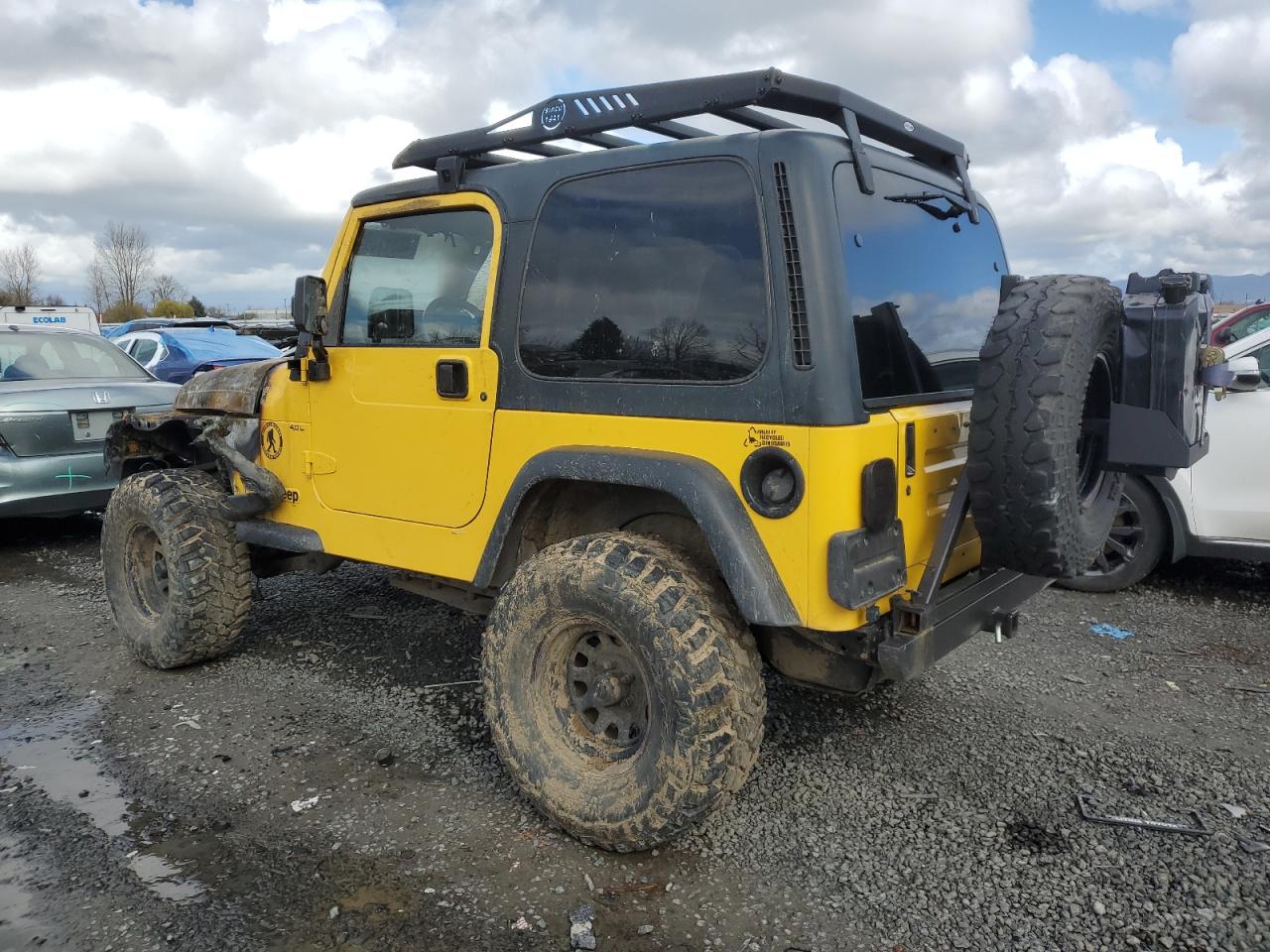 2000 Jeep Wrangler VIN 1J4FA49S3YP747043 Copart auction photo, burn damage thumbnail 2
