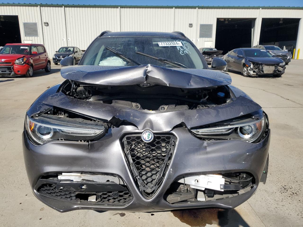 2019 Alfa Romeo Stelvio VIN ZASPAJAN4K7C71253 Copart auction photo, front end / rear end damage thumbnail 5