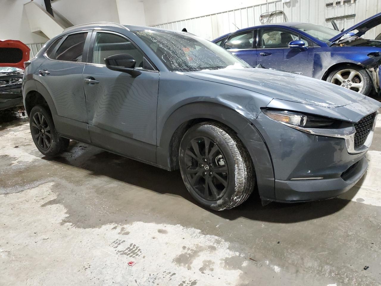 2024 Mazda CX-30 VIN 3MVDMBCM5RM677148 Copart auction photo, front end / side damage thumbnail 4