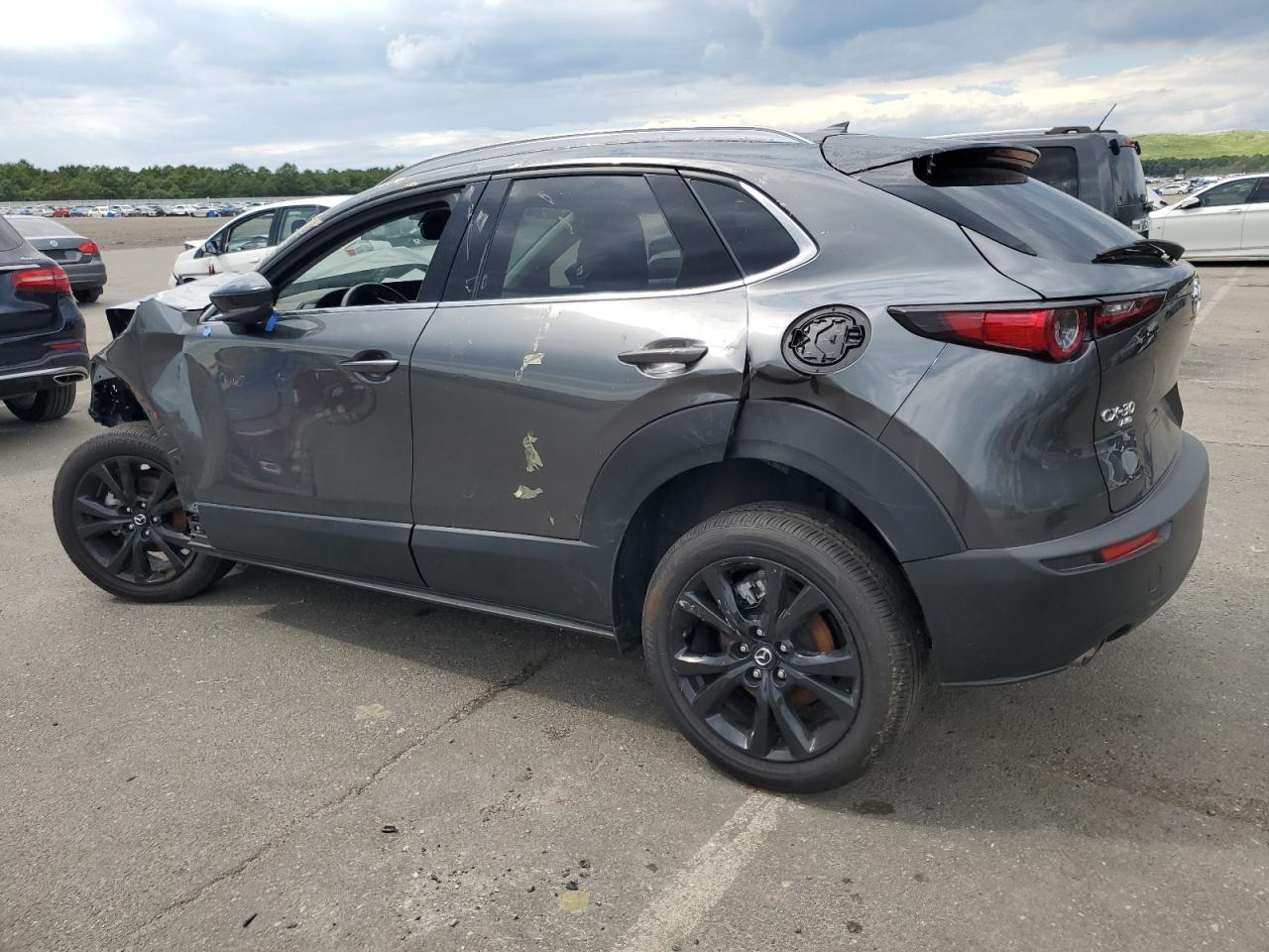 2023 Mazda CX-30 VIN 3MVDMBDY0PM569986 Copart auction photo, front end / rear end damage thumbnail 2