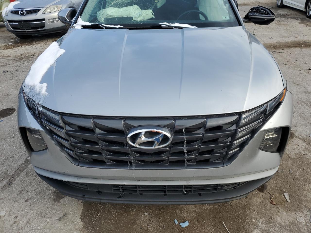 2022 Hyundai Tucson VIN 5NMJFCAE6NH063304 Copart auction photo, all over damage thumbnail 12