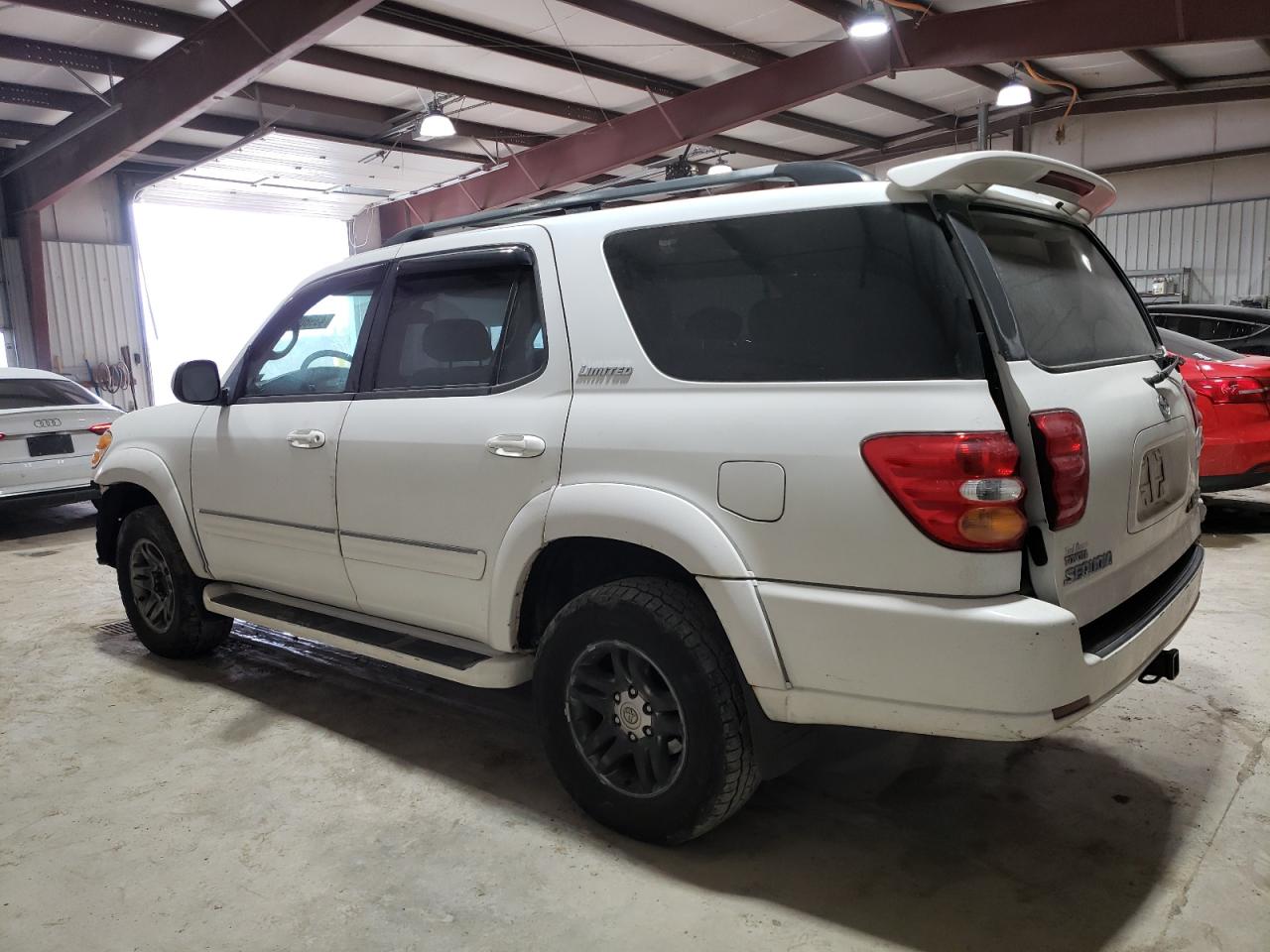 2004 Toyota Sequoia VIN 5TDBT48A94S211897 Copart auction photo, front end / rear end damage thumbnail 2