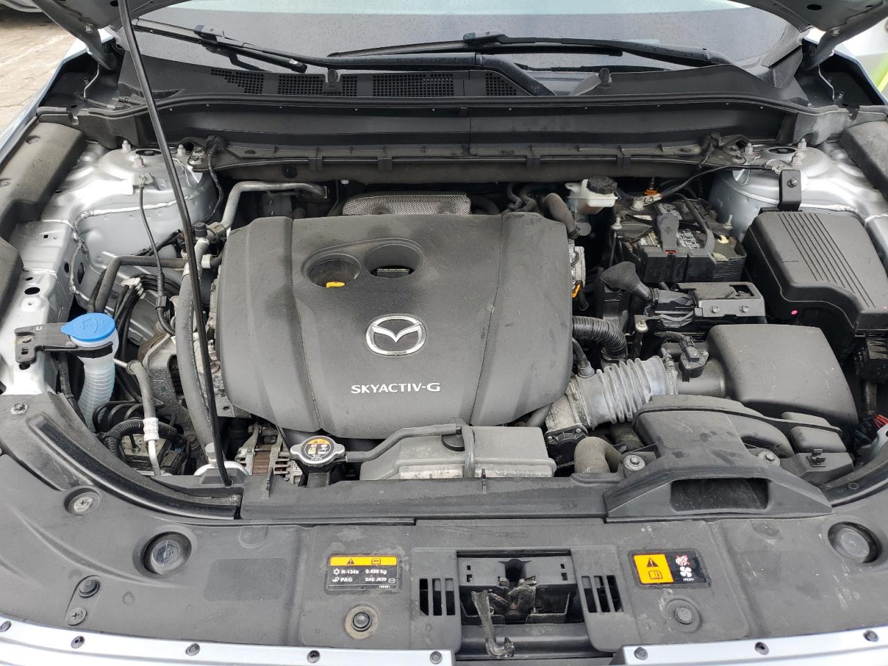 2021 Mazda CX-5 VIN JM3KFADM7M1339047 Copart auction photo, all over damage thumbnail 12