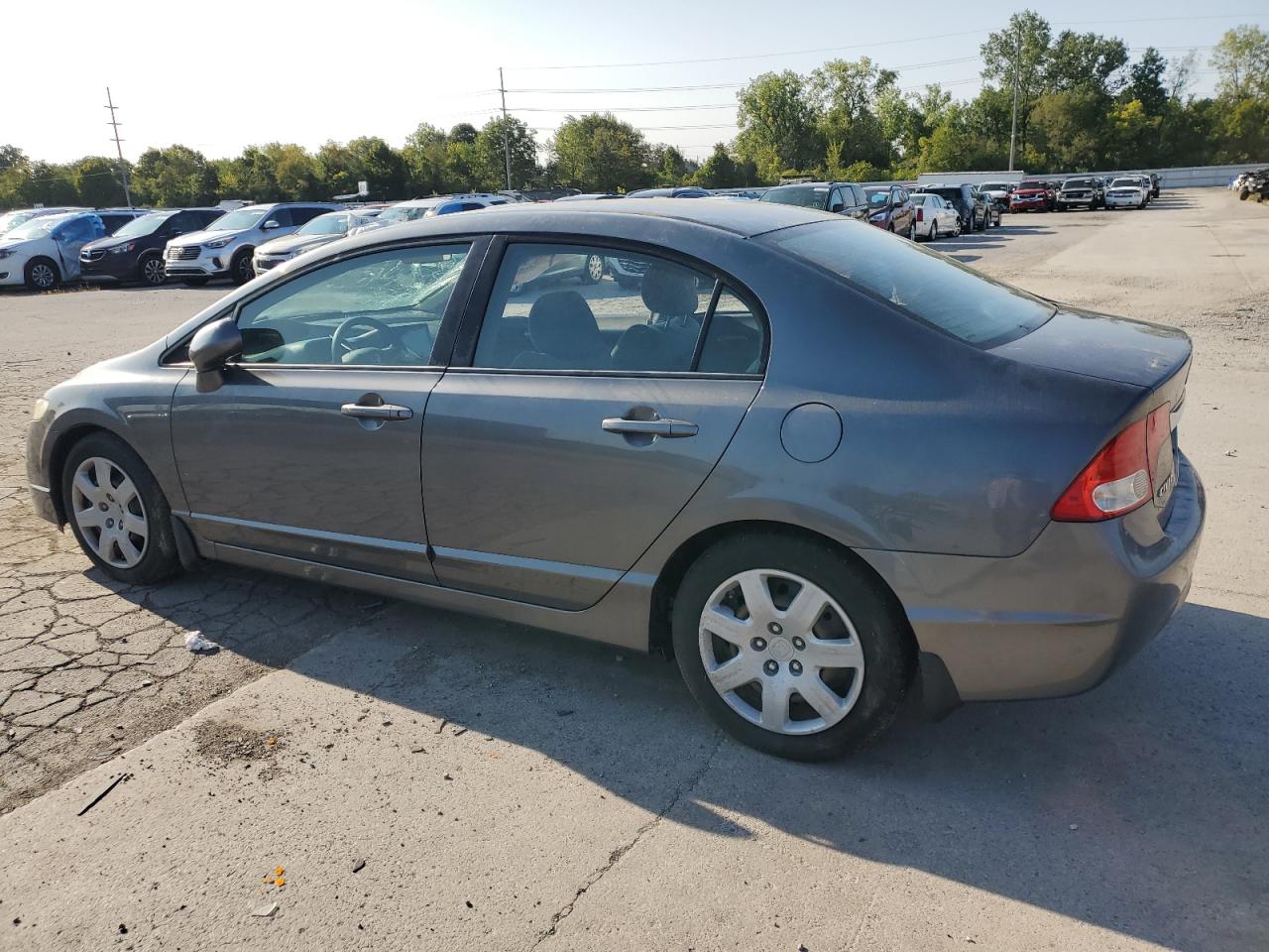 2010 Honda Civic VIN 19XFA1F58AE028329 Copart auction photo, side / front end damage thumbnail 2