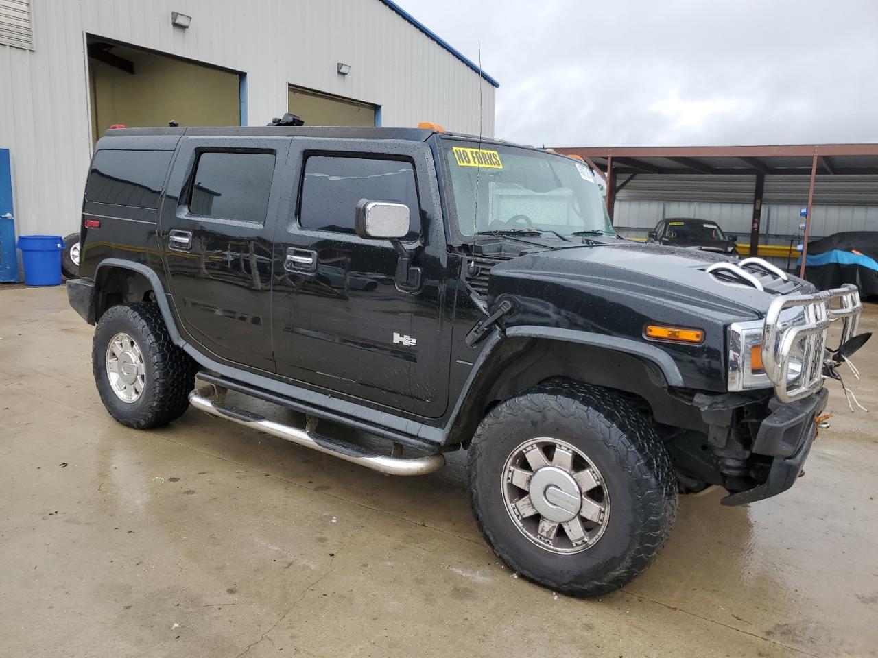 2004 Hummer H2 VIN 5GRGN23U74H102864 Copart auction photo, front end / side damage thumbnail 4