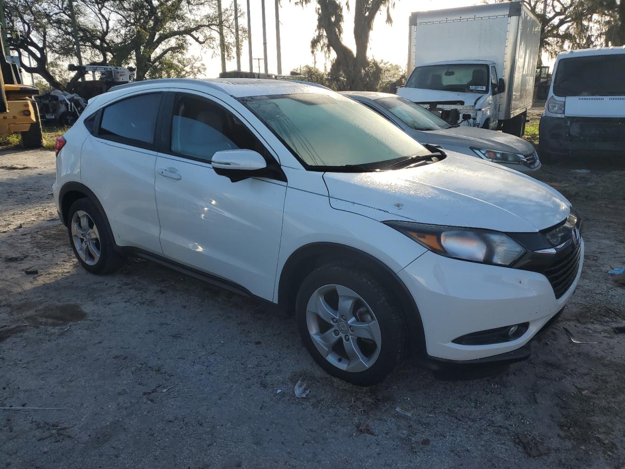 2016 Honda HR-V VIN 3CZRU5H77GM729351 Copart auction photo, side / minor dent/scratches damage thumbnail 4