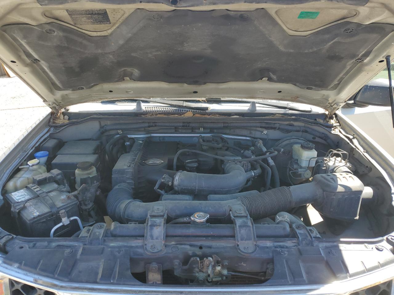 2006 Nissan Navara (Frontier) VIN 1N6BD06T56C432778 Copart auction photo, side / rear end damage thumbnail 11