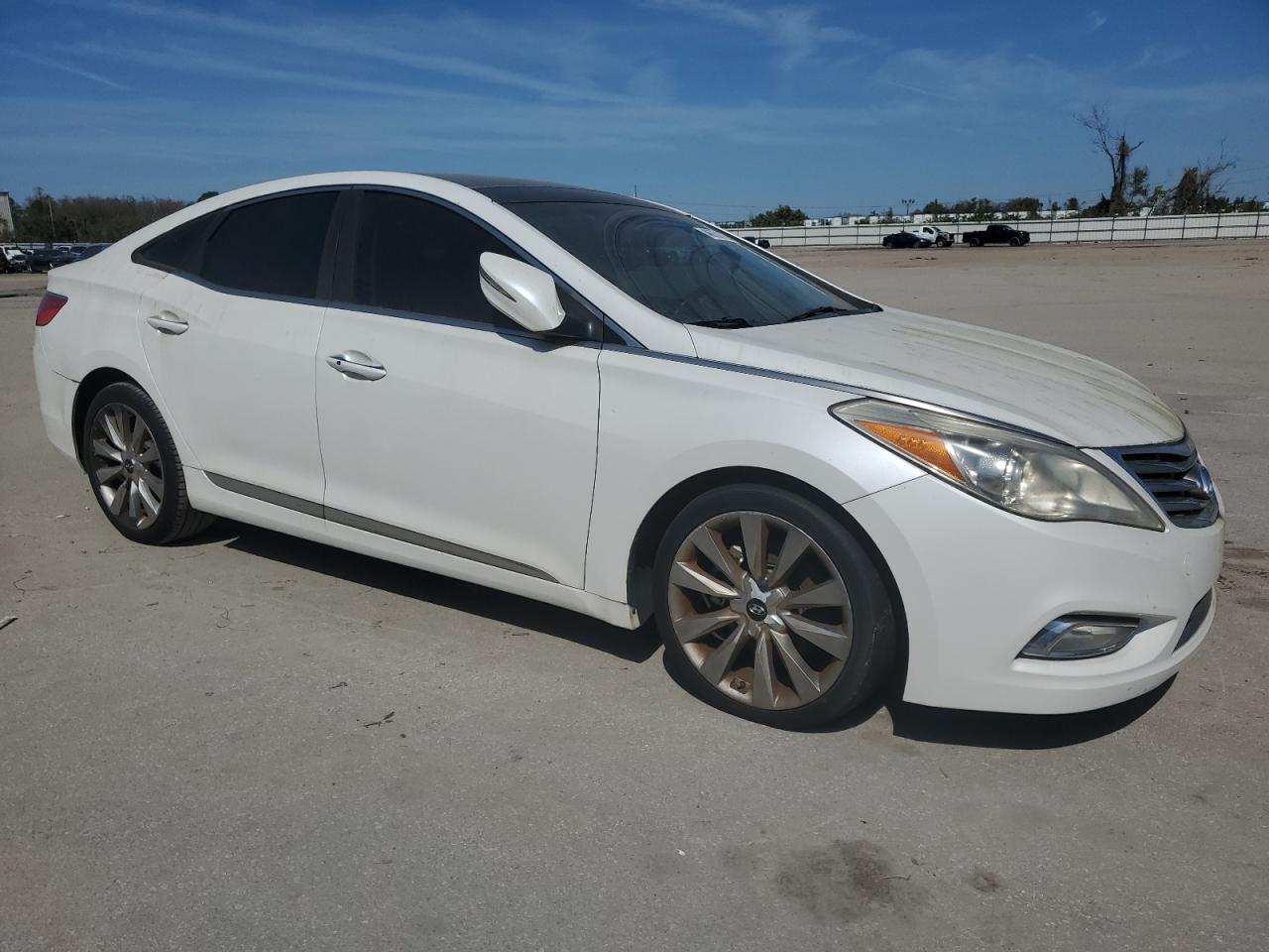2012 Hyundai Azera VIN KMHFH4JG7CA117199 Copart auction photo, minor dent/scratches damage thumbnail 4
