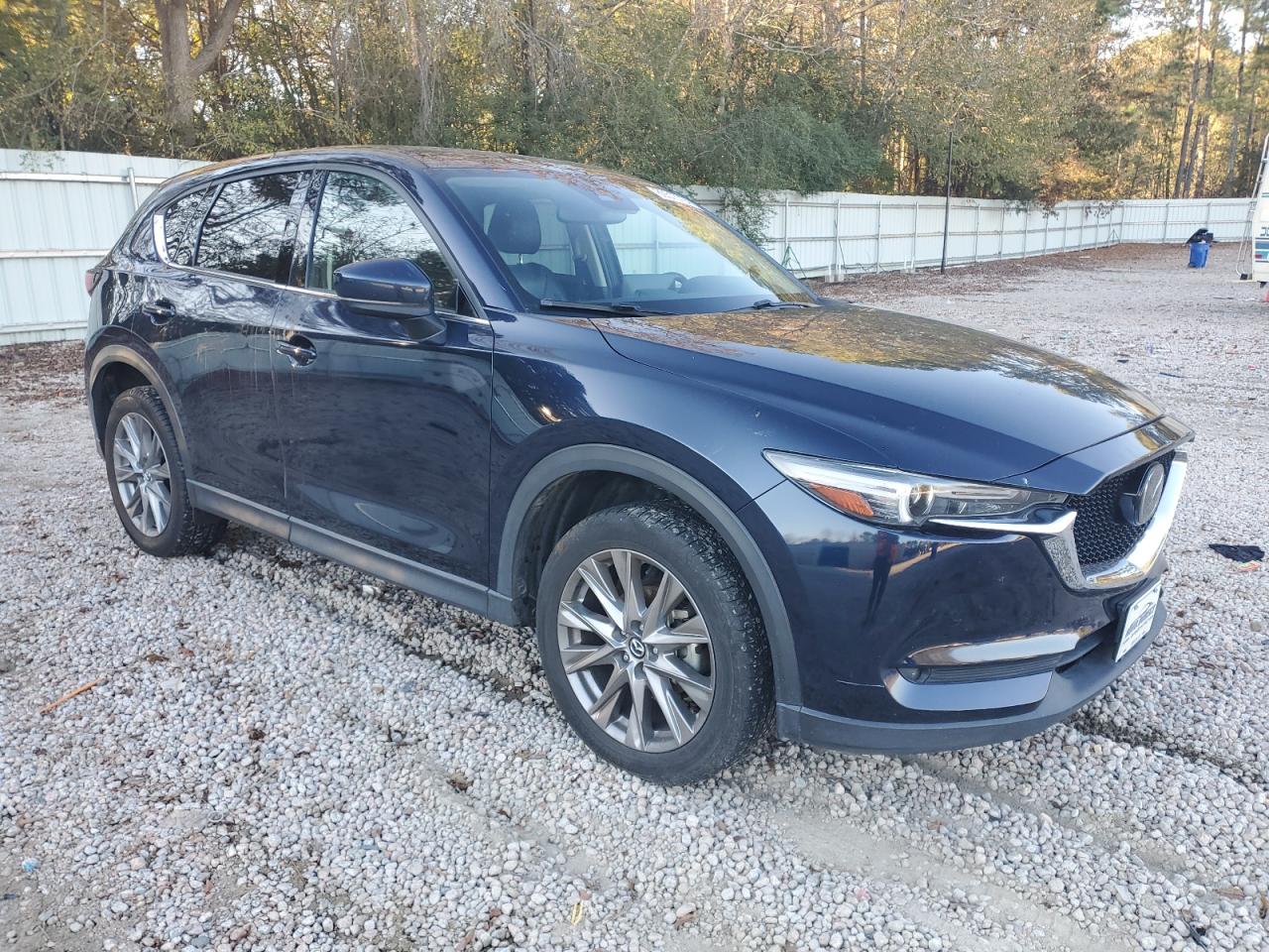 2021 Mazda CX-5 VIN JM3KFBDM9M0360719 Copart auction photo, front end / side damage thumbnail 4